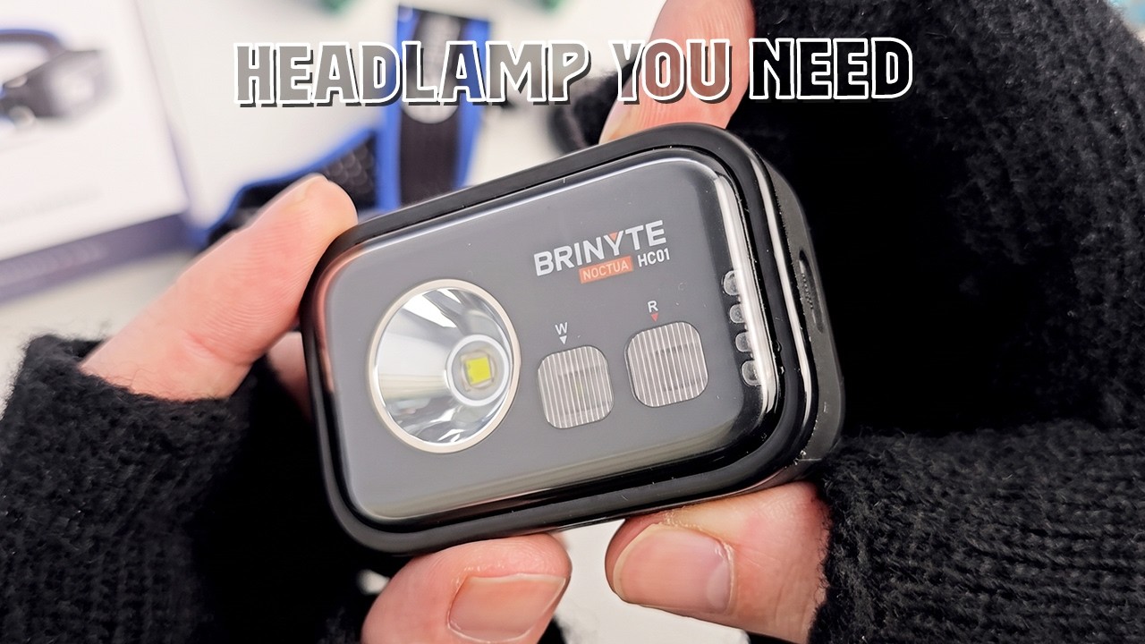 A close-up of the Brinyte HC01 headlamp showing the white and red auxiliary lights and buttons.
