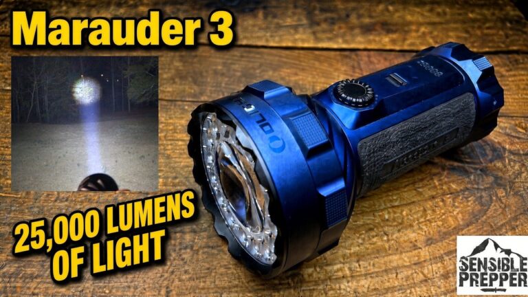 A person holding the large Olight Marauder 3 flashlight, highlighting the side toggle and front-facing lens.