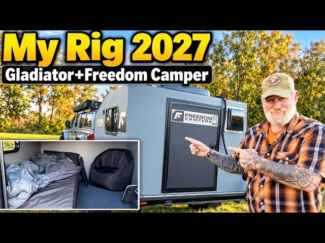 A white Freedom Camper trailer attached to a Jeep Gladiator, showing the exterior setup and 32-inch tires.